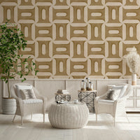 Earthy camel tone wall mural with geometric shapes for an entryway.