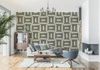Muted olive and cream wallpaper mural for a hallway accent wall project.