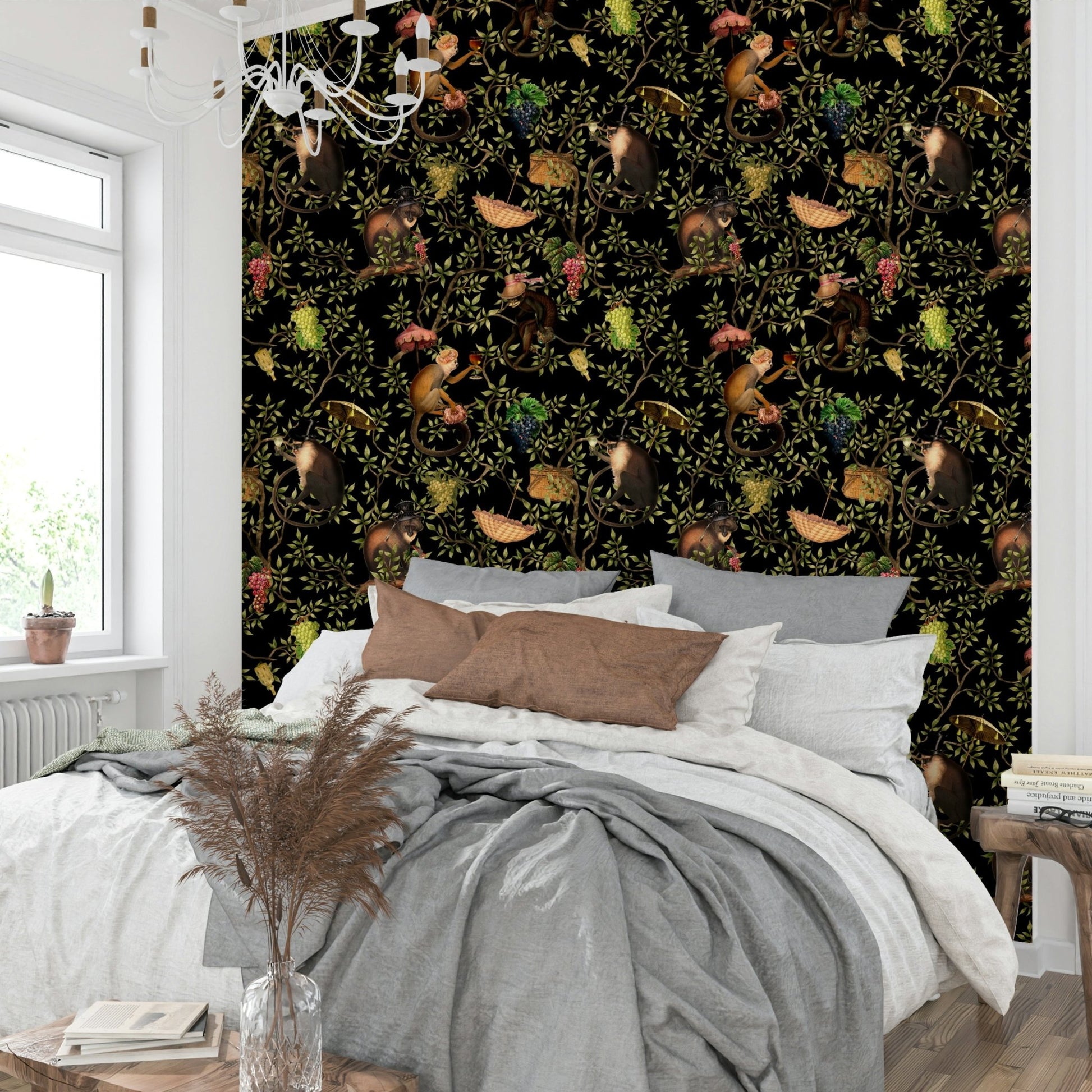 Whimsical monkeys in jungle with vines on wallpaper design.

