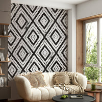 Monochromatic mosaic wall mural in grayscale tones

