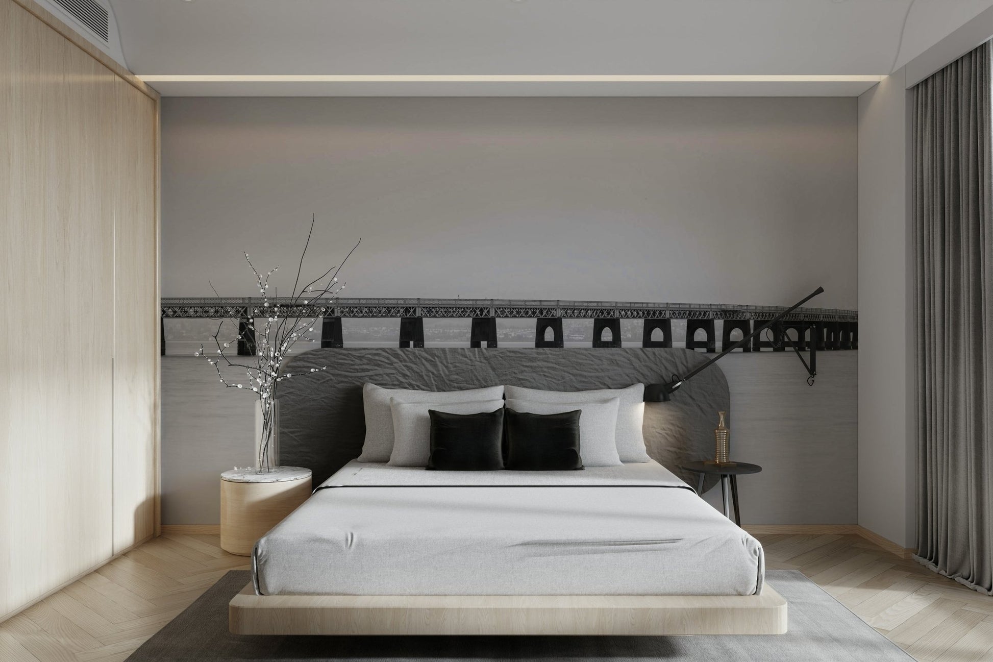 A wall mural of a peaceful bridge scene.

