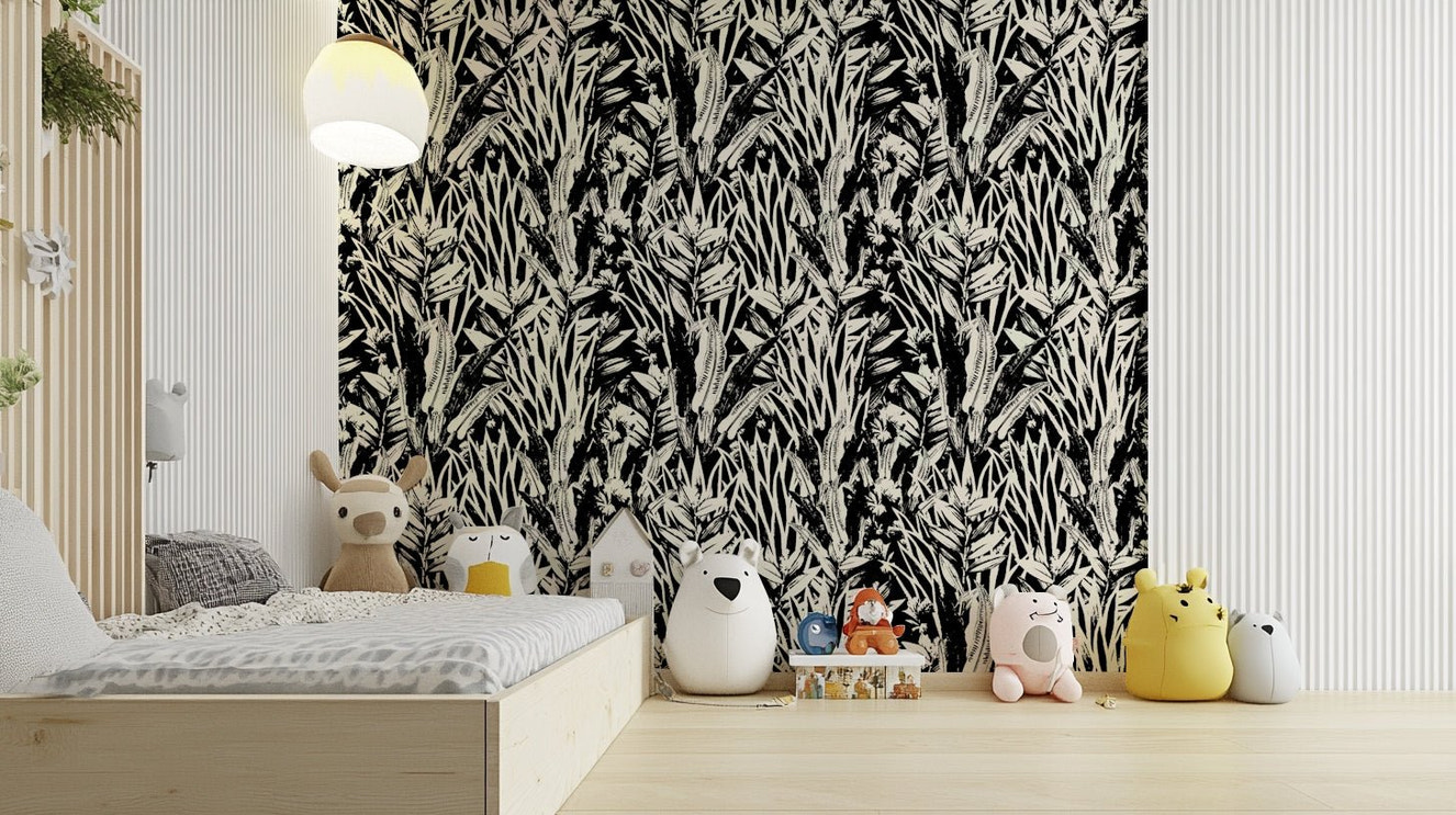 An angled shot of a wall with monochrome wallpaper

