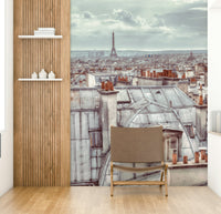 The colors are muted, with tones of gray, white, and red.

