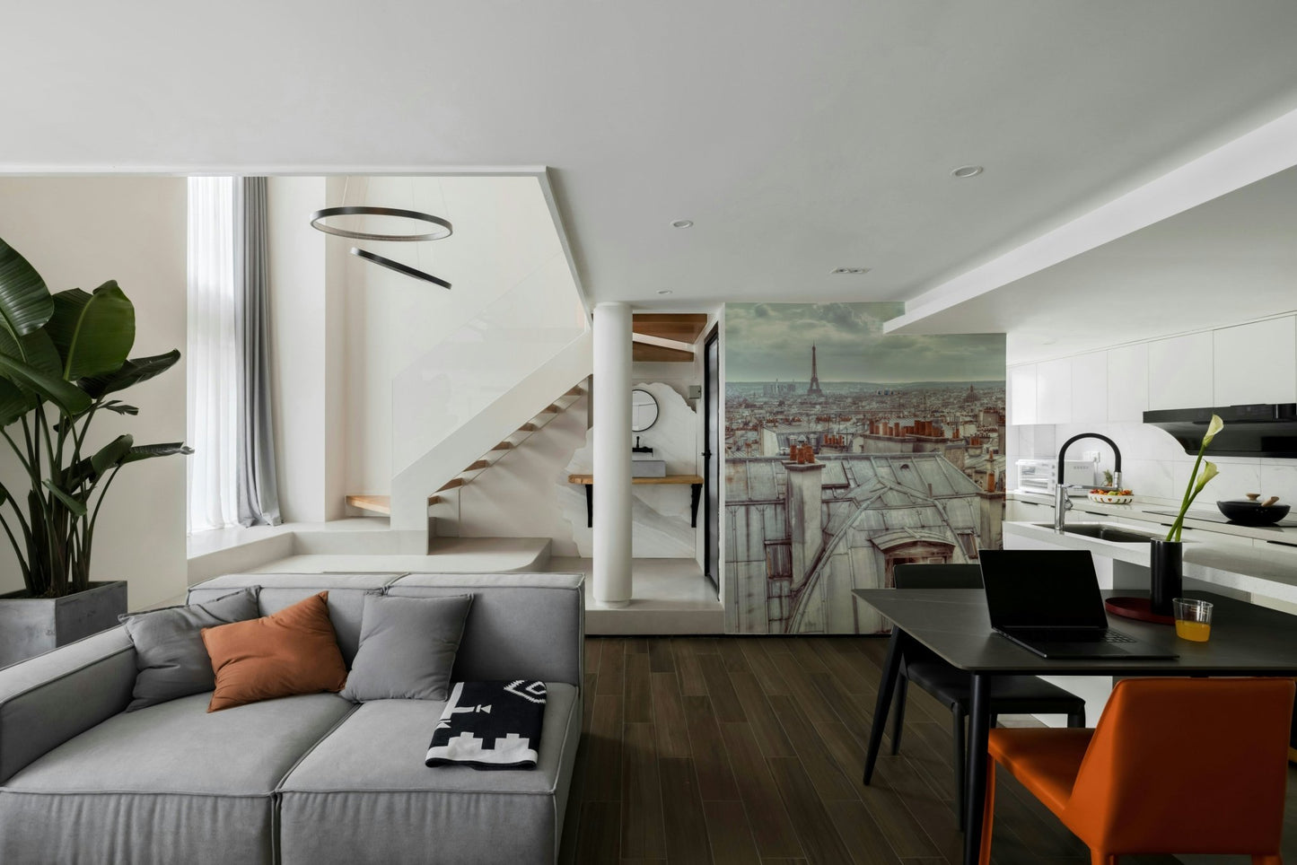 The mural gives a feeling of being in Paris.

