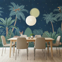 Minimalist nursery featuring a muted Moonlit Jungle wallpaper.