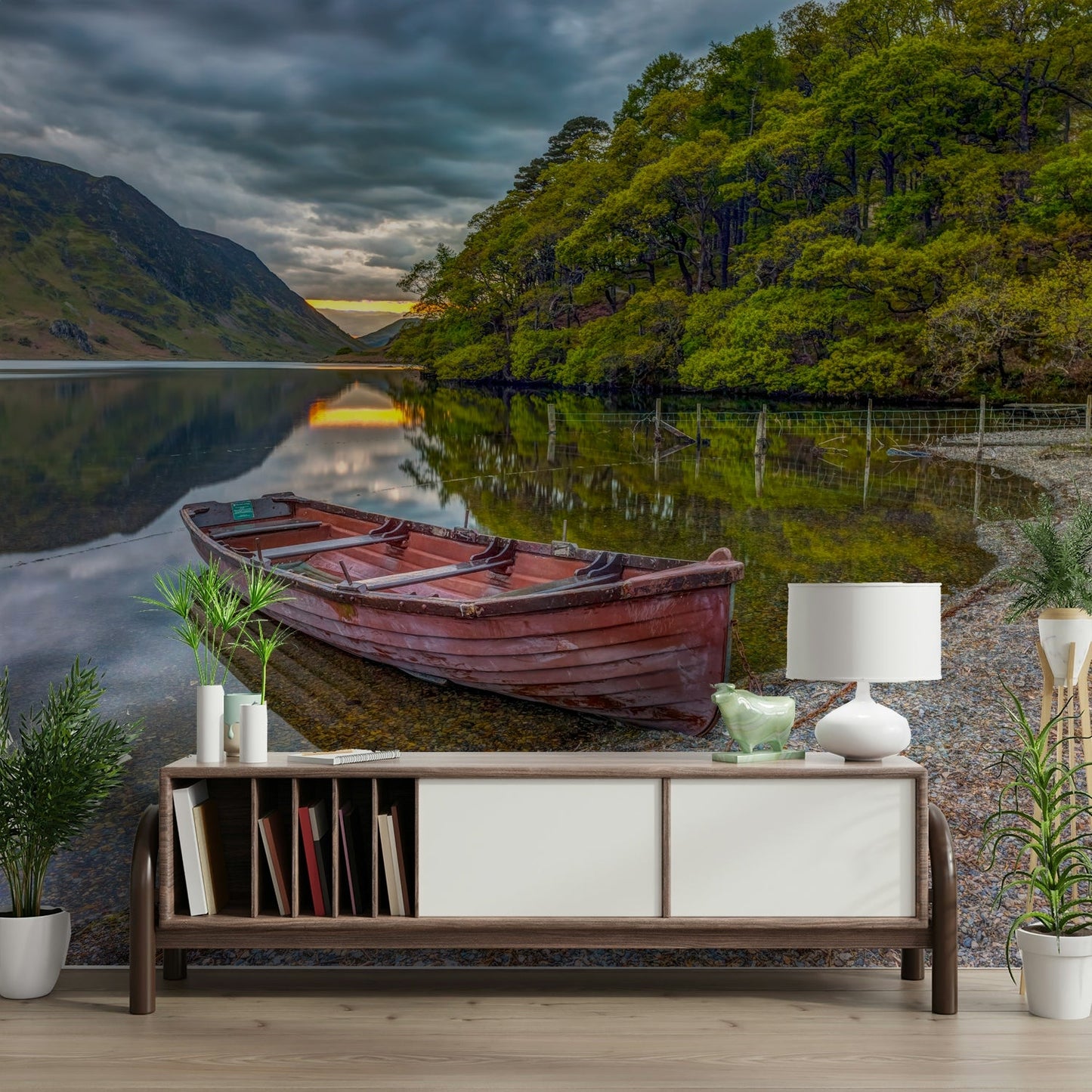 The boat is a red rowboat, moored near the shoreline.

