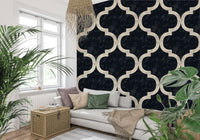 Deep ink black wallpaper featuring a Moroccan ogee trellis in a balanced, all-over repeat.