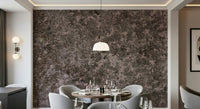 Installation image of the simple-to-apply Mottled Earth peel and stick wallpaper.