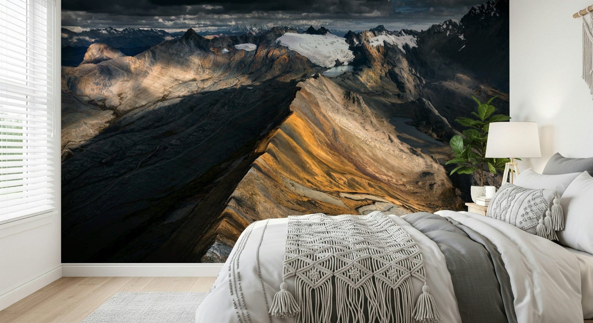 A peaceful mountain range mural on decorative wallpaper.