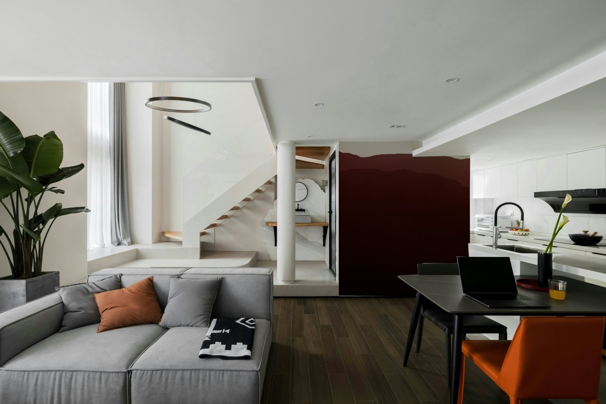 A close-up of the layered, misty mountains at dusk.