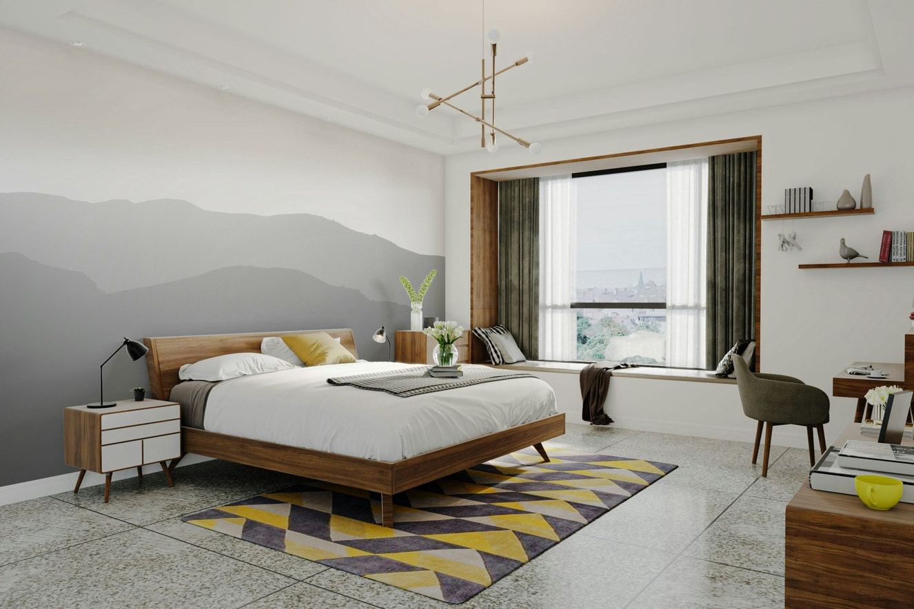 A contemporary living room with a large mountain landscape wall mural.
