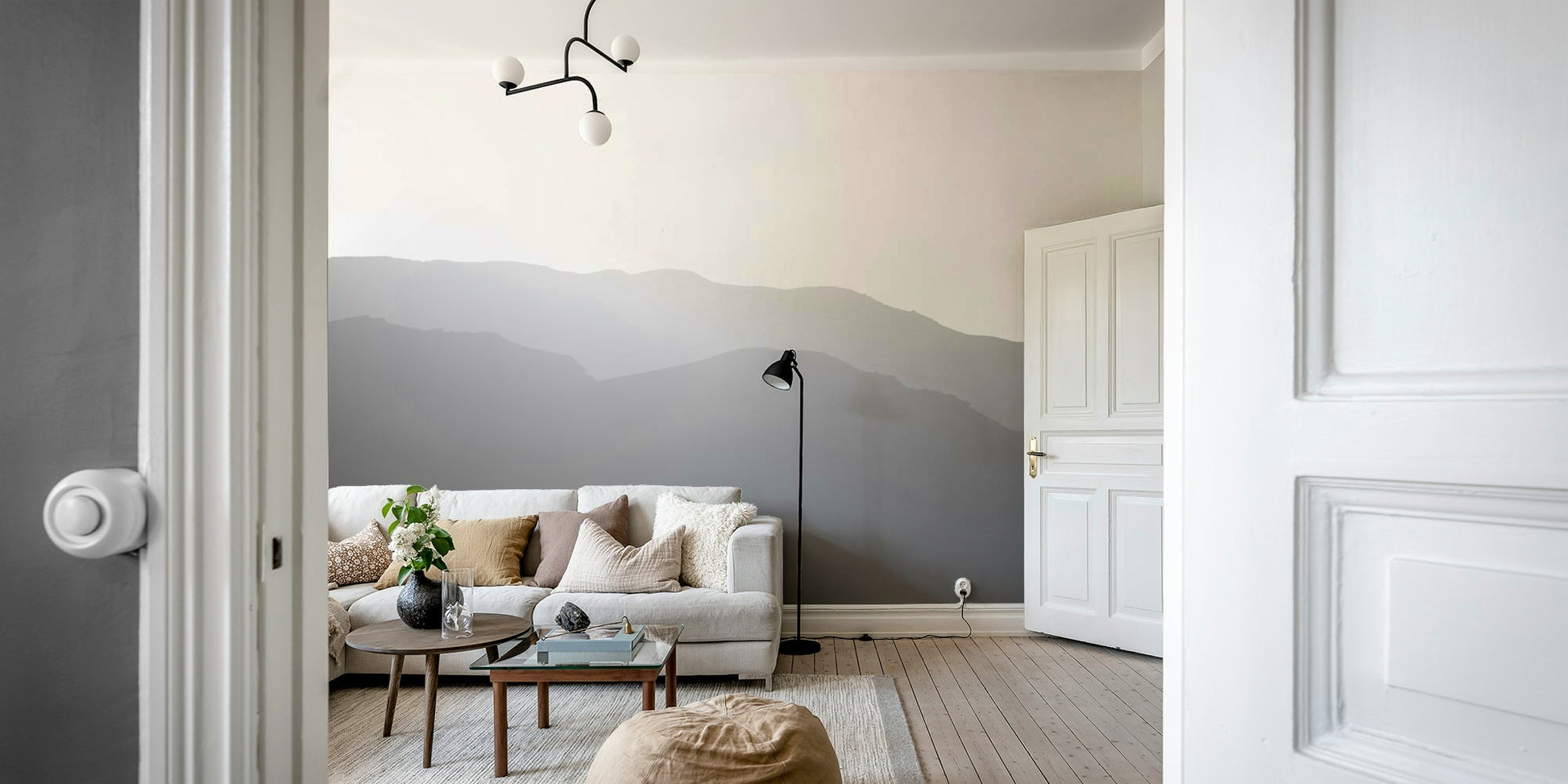 The peel and stick wallpaper on a smooth wall surface.