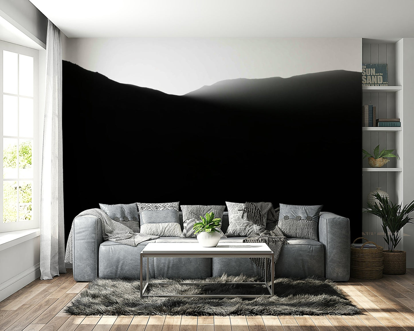 A close-up of the layered, misty mountains at dusk.