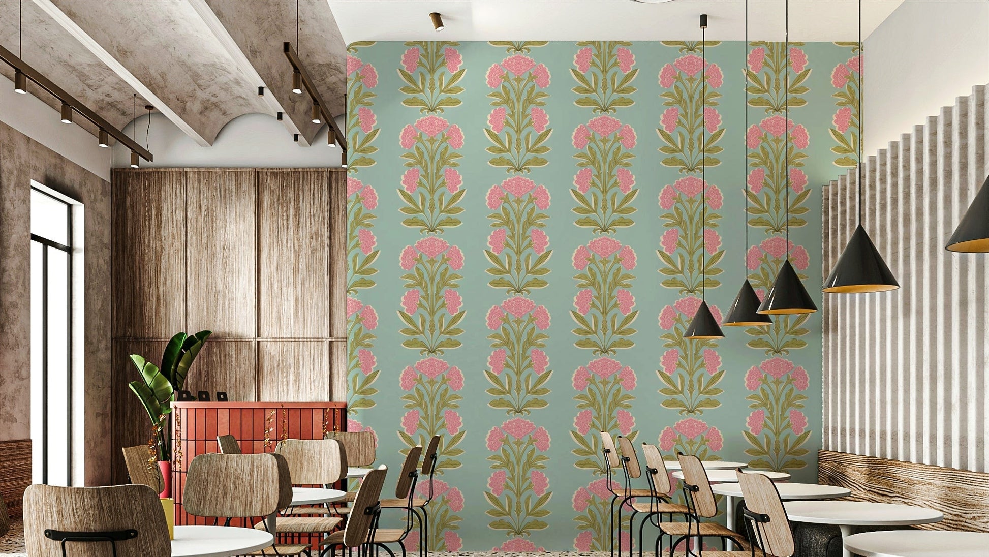 A wall mural of a symmetrical floral and leaf pattern.

