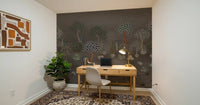 A cosy reading nook wrapped in Muted Forest Tapestry Wall Mural and warm accents, GD8958