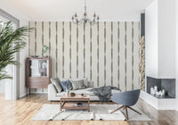 Vertical charcoal columns scatter over Muted Green Distressed Stripe Cream wallpaper.⁠GD9607