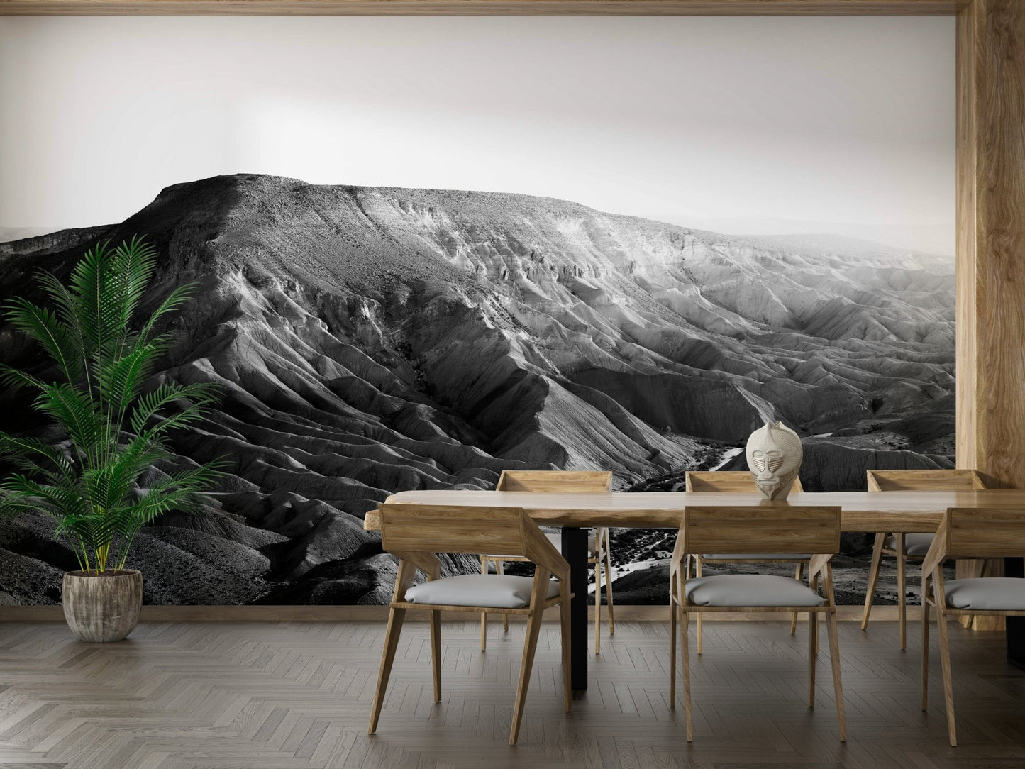 An artistic desert canyon mural on minimalist wallpaper.

