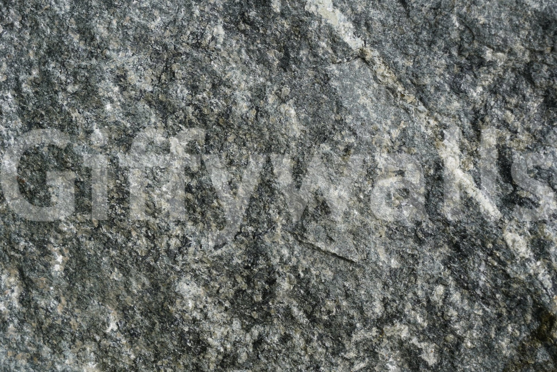 Spa-like bathroom with natural stone finish wall mural.