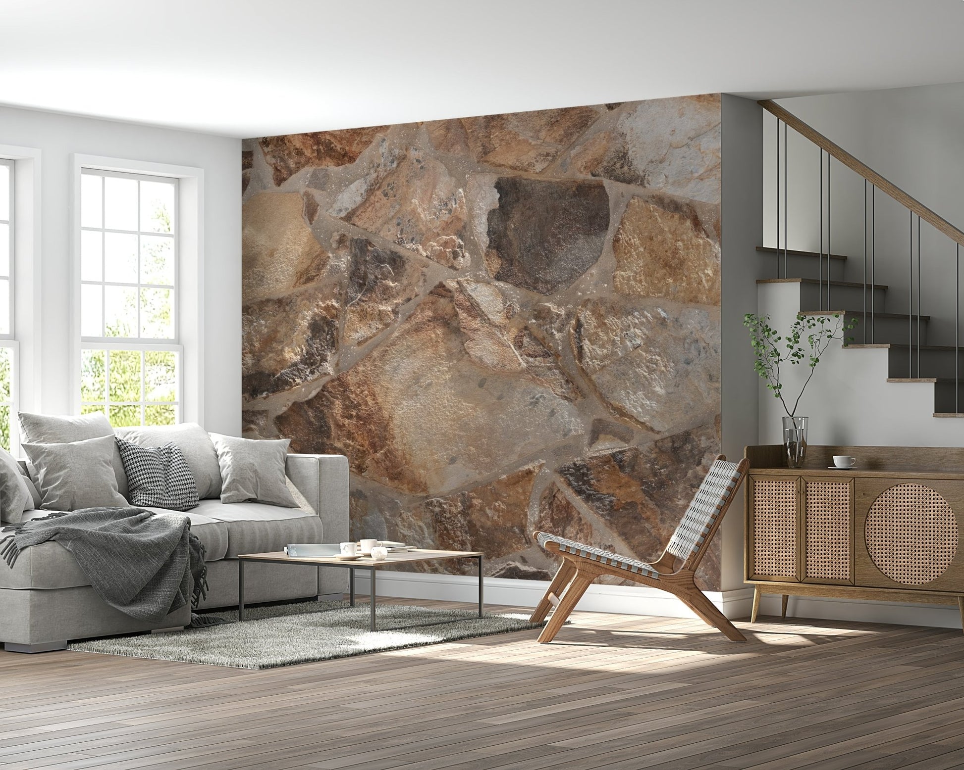 A hand applying the Natural Stone Fusion realistic stone mural.