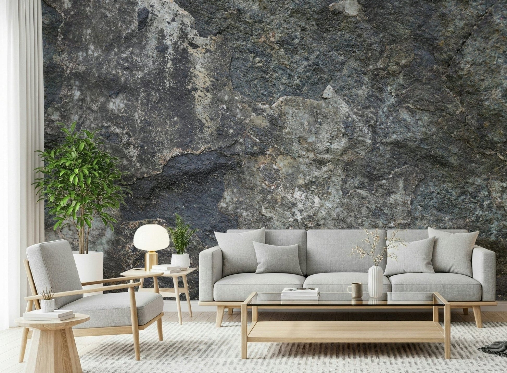 Earthy tone rock mural behind a wooden desk in a study area.