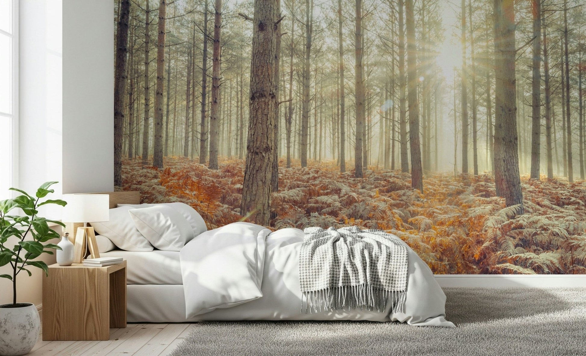Elegant tree pattern wallpaper for a calming guest room atmosphere.