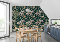 Botanical branch detail flows through Navy Floral Bird Wallpaper