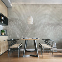 Soft palm leaf wallpaper with neutral tones
