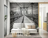 Street-level view mural of Brooklyn Bridge and classic NYC vibe.

