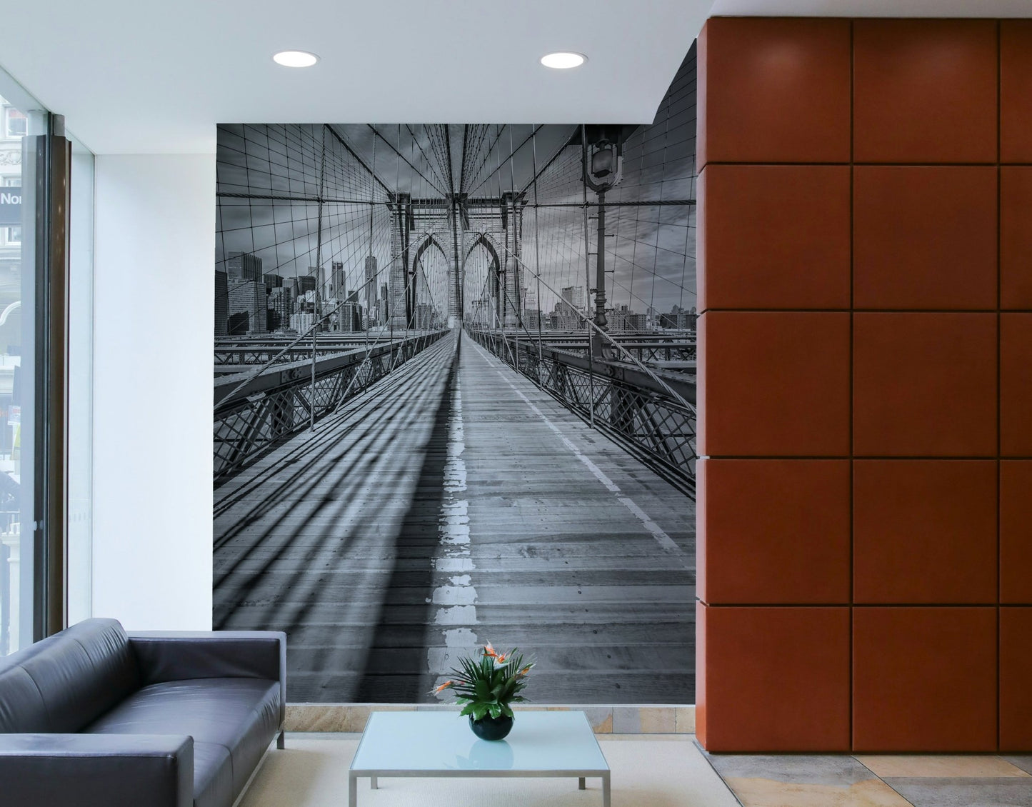 Cityscape wall mural highlighting the structure of Brooklyn Bridge.

