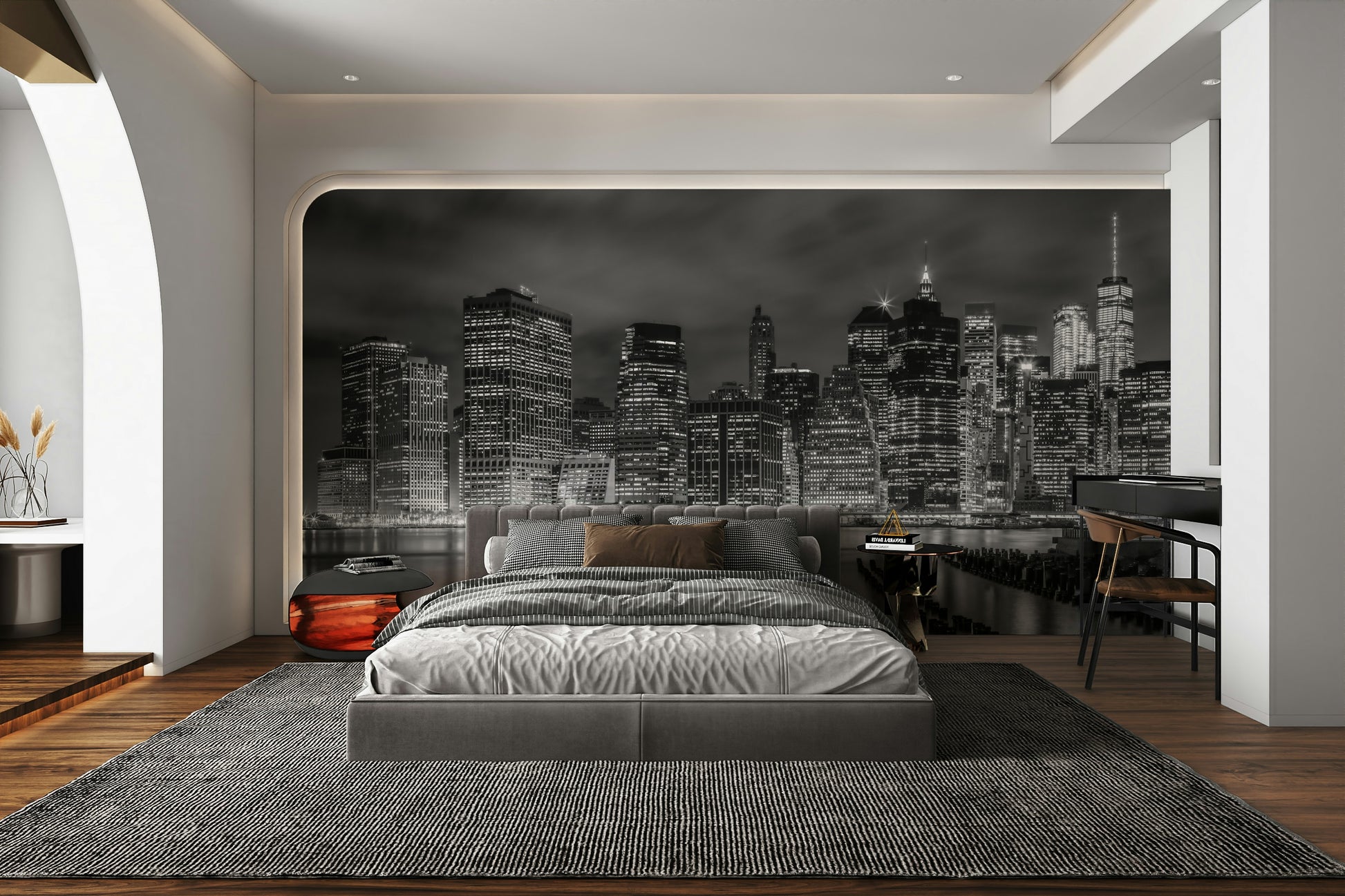 Dramatic mural of Manhattan at night in grayscale tones.

