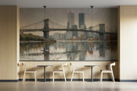 The colors are a mix of deep blues, blacks, and warm yellows from the lights.
