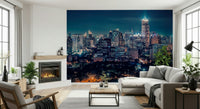 Night Cityscape wallpaper showing glowing city lights from above.