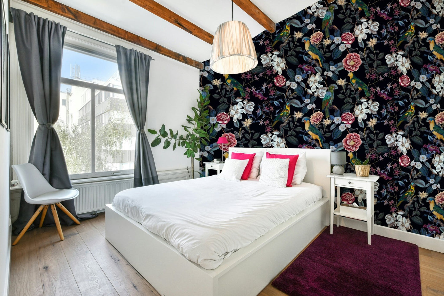 Enchanting tropical leaves under a night sky wallpaper design.

