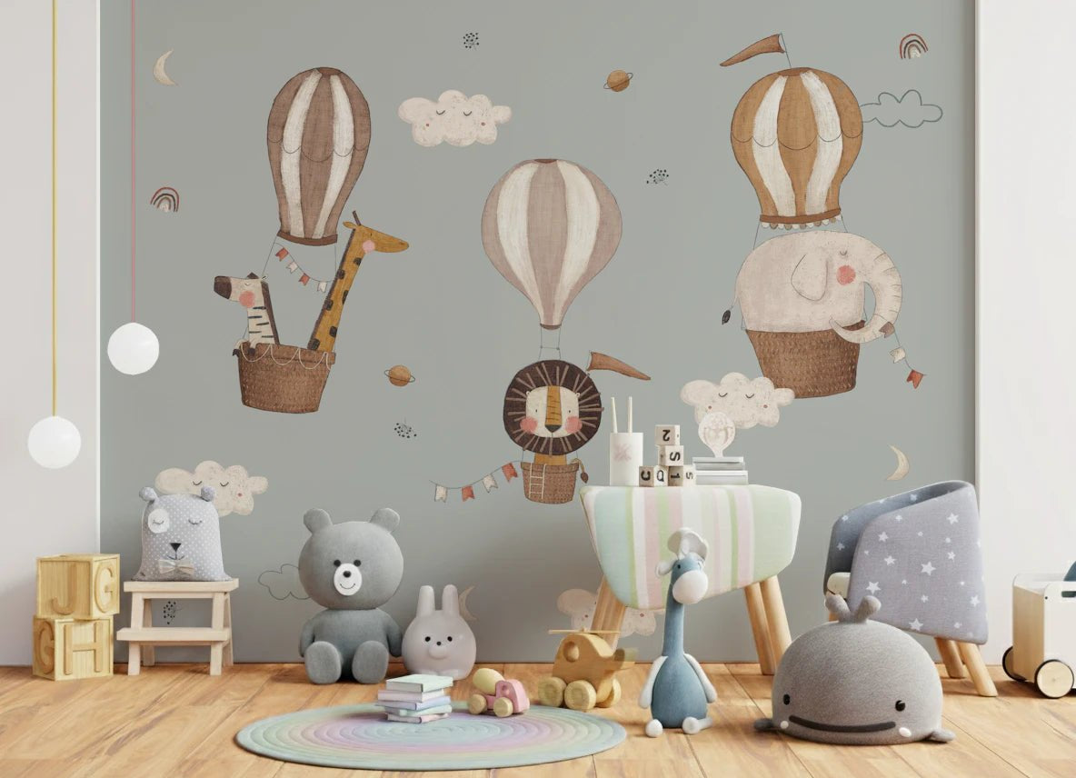 Playroom corner styled with Nursery Hot Air Balloons Wall Mural and soft animal toys