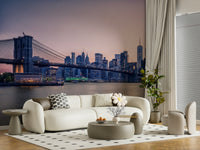NYC Bridge at Dusk Wall Mural pairs beautifully with this curved sofa and soft lighting