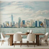 NYC Skyline View Wall Mural pairs beautifully with this dining area and soft natural light
