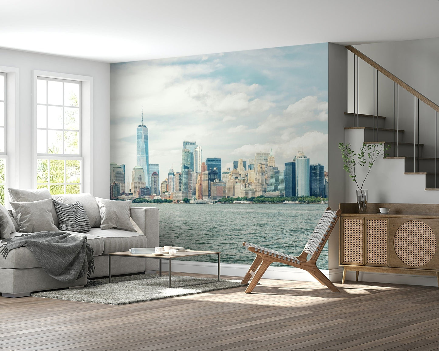 NYC Skyline View Wall Mural opens up this airy lounge with skyline and shoreline detail