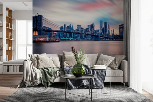 NYC Twilight Dreams wall mural with glowing skyline in a modern living room.