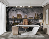 The wallpaper is used as a feature wall in a bedroom.

