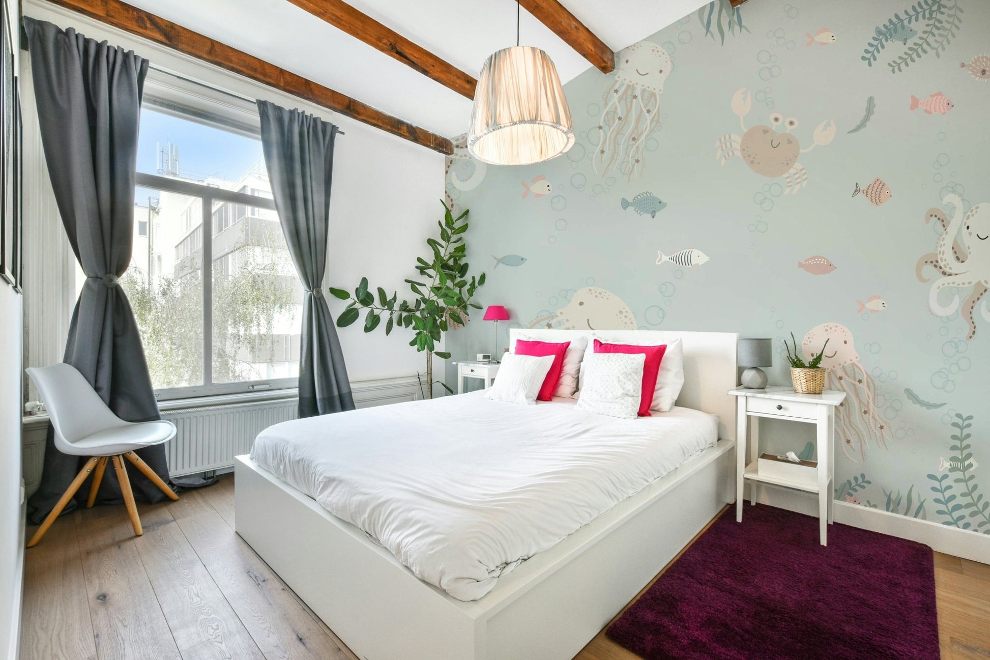 The background is a soft, light blue underwater scene.

