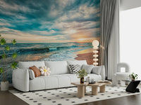 Soft lounge interior featuring Ocean Hues Wall Mural and a sunset beach horizon