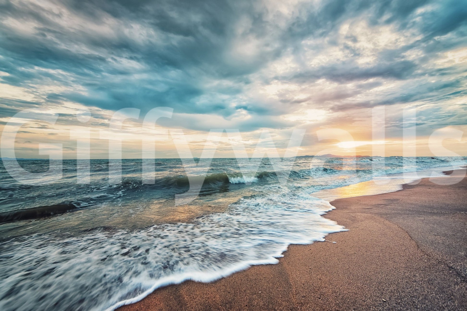 Ocean Hues wall mural with foamy waves, sandy shore, and moody sunset cloud cover