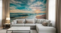 Corner sofa styled with Ocean Hues Wall Mural and a glowing wave-washed coast