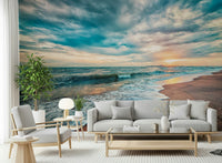 Ocean Hues Wall Mural adds oceanfront movement to a relaxed sofa wall setup