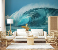 Serene blue sea wall mural depicting a powerful curling ocean wave.