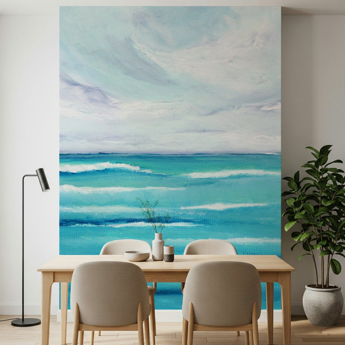 Above dining room seating, Ocean's Embrace wall mural keeps the mood open and easy