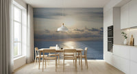 Serene beach scenery wall mural in warm yellow and soft blue tones.