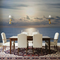 Detailed Ocean's Golden Embrace Wall Mural with a shimmering water surface.