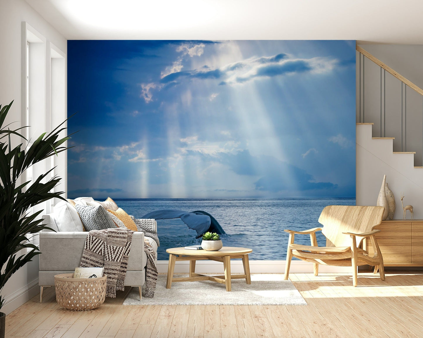 Ocean's Grace Wall Mural in a bright living room with blue accents wallpaper.