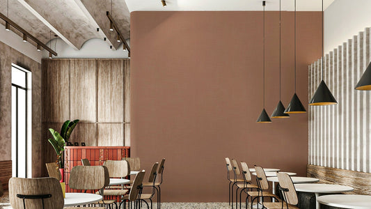 The wallpaper is installed in a modern, minimalist living room.

